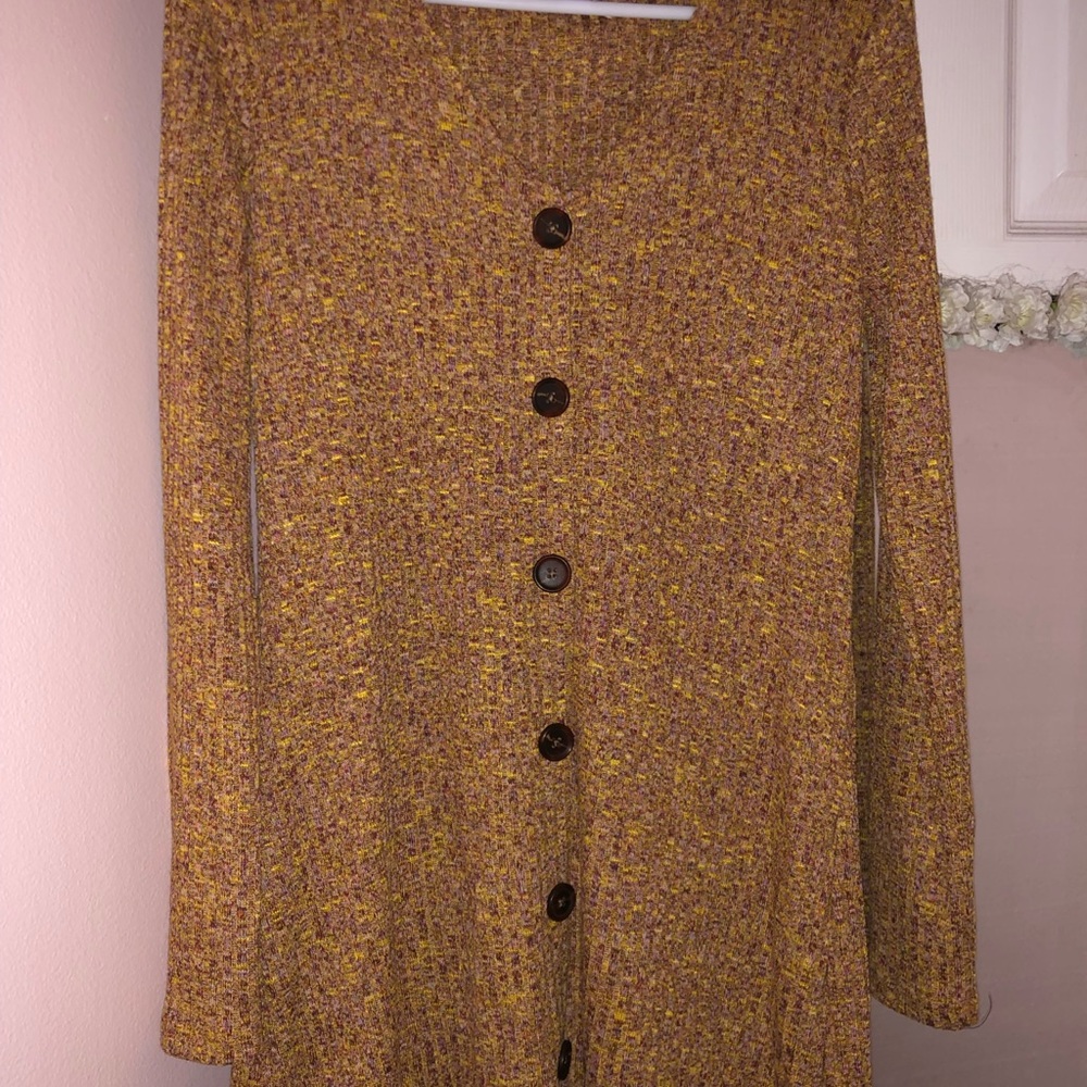 Mustard colored dress.